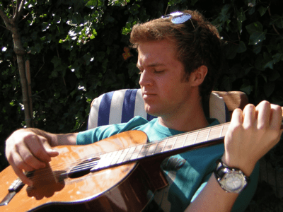 College student playing guitar