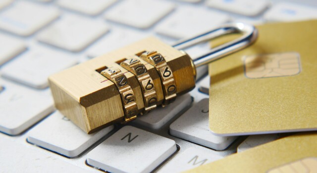 Agoldenpadlocksittingontopofakeyboard